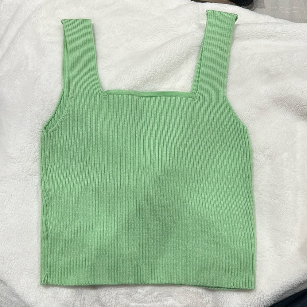 green tank top